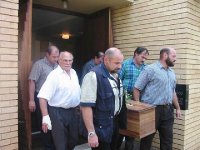 maddies coffin carried by her dad & brothers 2.jpg