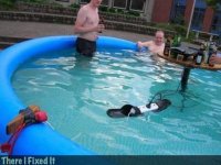 Men Fix it - in swimming pool with electricity.jpg