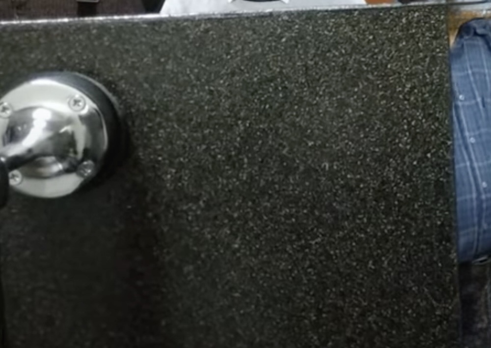a painted rectangular eps sheet fixed in 2 points through a soft pad.jpg