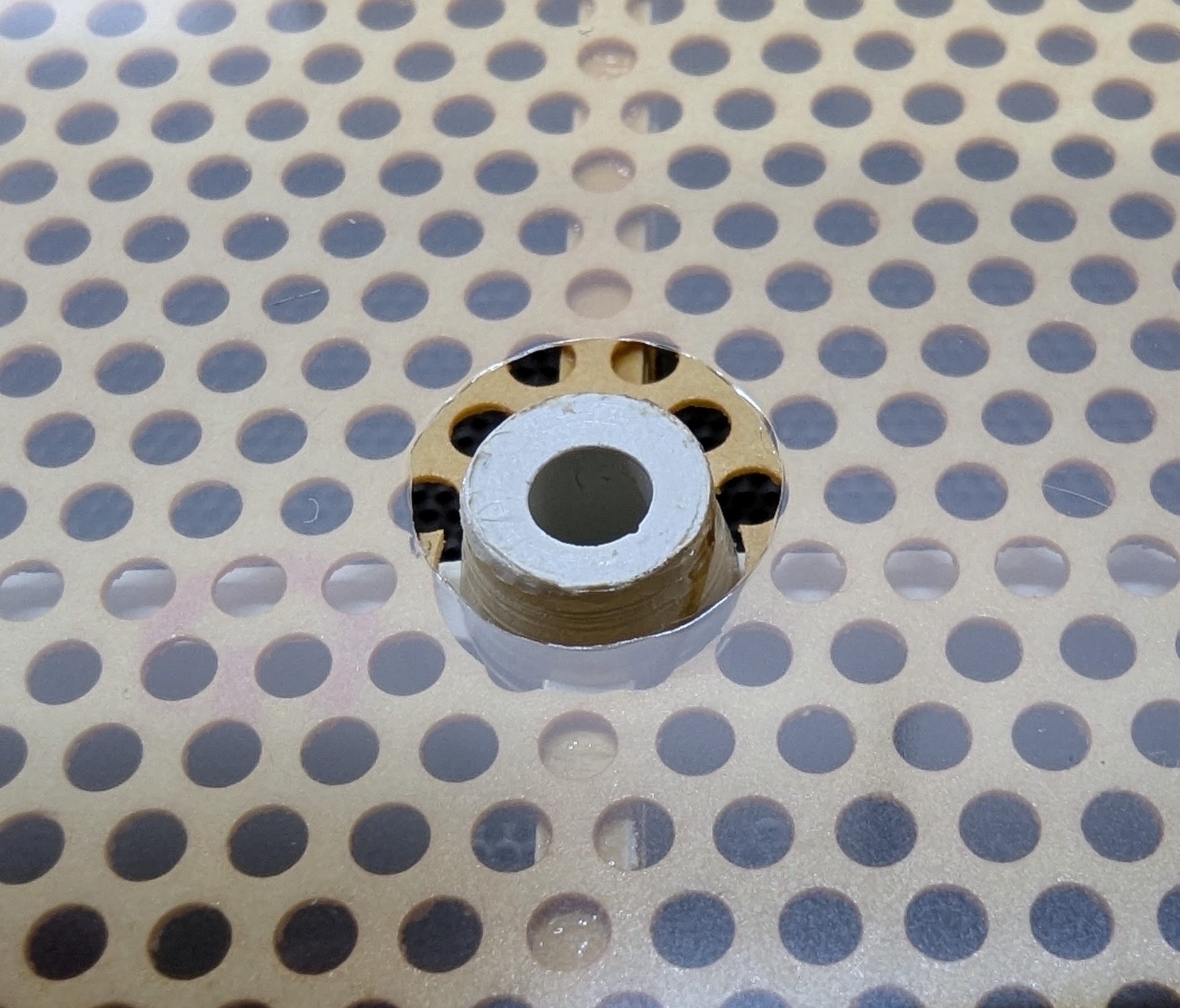 ESL-63 small hole in diaphragm around post.jpg