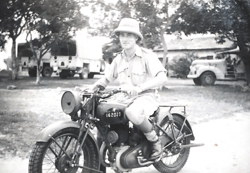 Major Norman gets on his Bike in 1940.png