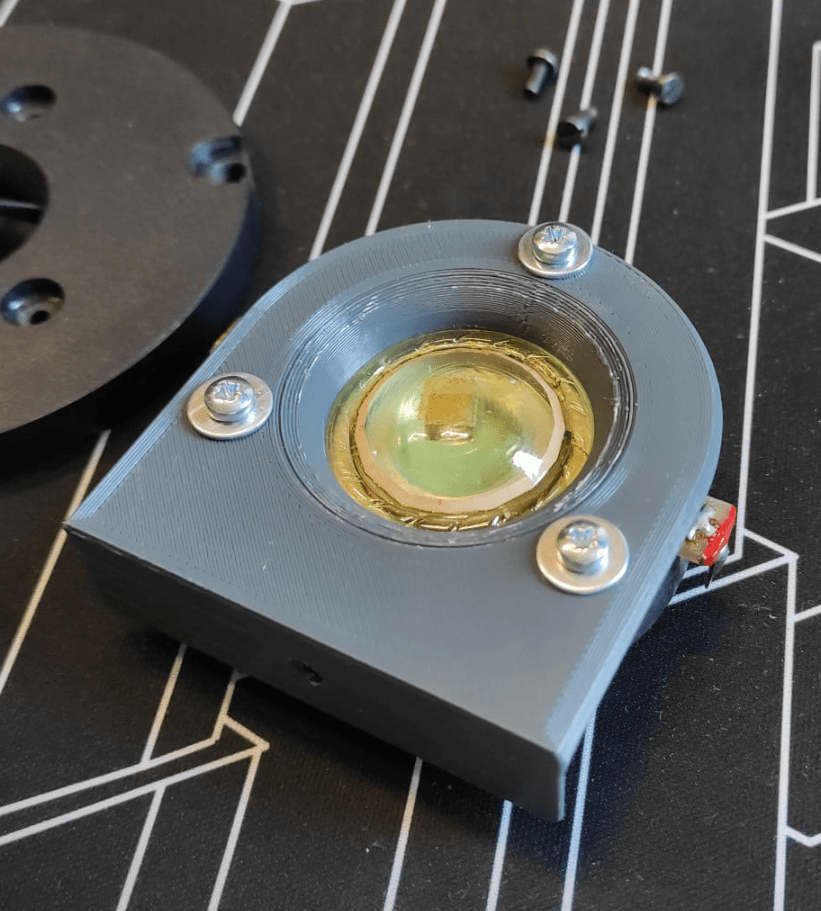 The Philips mylar tweeter, mounted to the new faceplate.