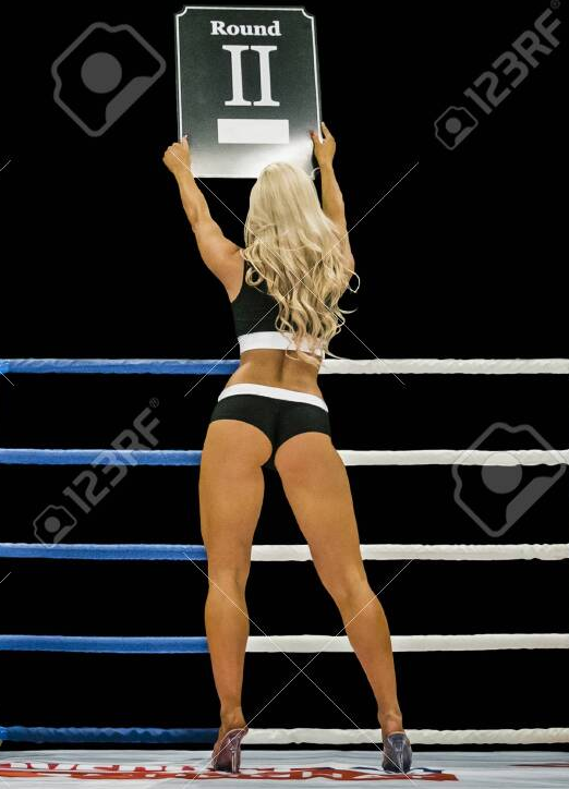 Screenshot 2025-06-24 at 16-48-45 135240095-back-boxing-ring-girl-carrying-sign-that-displays-...png