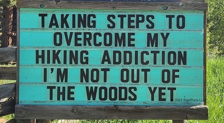 vince-sign-guy-taking-steps-overcome-my-hiking-addiction-not-out-woods-yet-2023-signpuns.jpeg