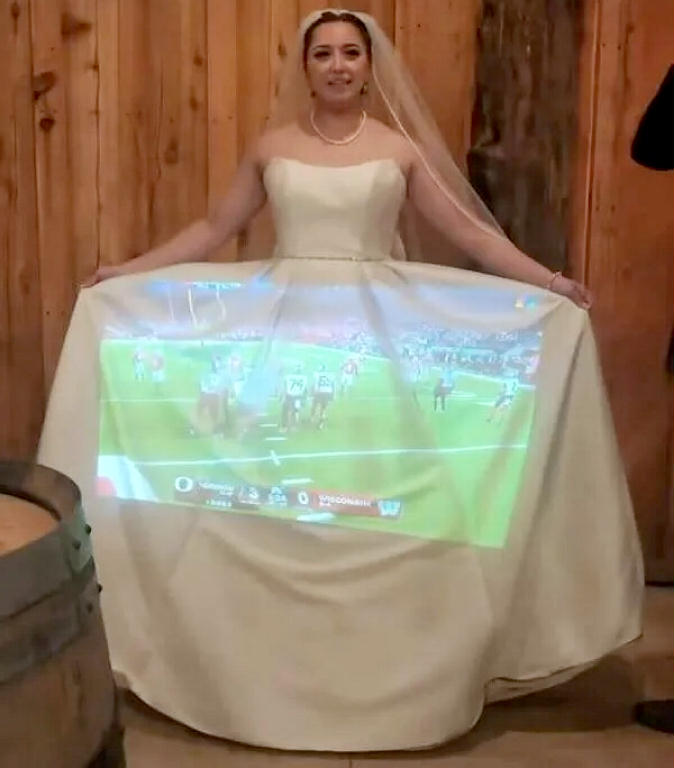 WatchingTheGameAtTheWedding.jpg