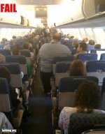 Big man in airplane seat.jpg