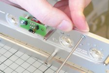062 Method of Assembly - Fixing front Outer Panel with Cut-Down Screws.JPG