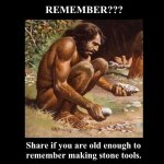 Caveman with stone tools.jpg