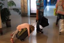 o-TIRED-GIRL-AIRPORT-SUITCASE-facebook_15004870823804.jpg