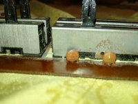 ceramic capacitors (up on the two tone controls sliders) welded back on the circuit board with t.jpg