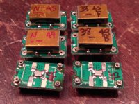 Some completed clocks on adapters.jpg