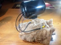 Bare enclosure with loose fiberglass.jpg