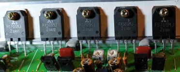 Photo of Output mosfets, note two furthest right are odd.jpg