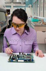 depositphotos_50614513-stock-photo-woman-soldering.jpg
