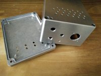 9. holes drilled, brushed case.jpg